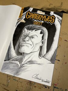 Black and white portrait of a Gargoyle, drawn in pen, ink, and alcohol markers, on a "Gargoyles Quest" blank sketch cover.