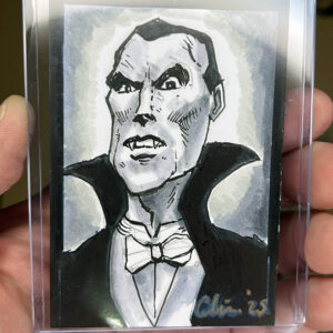 Black and white drawing of Dracula on a sketch card